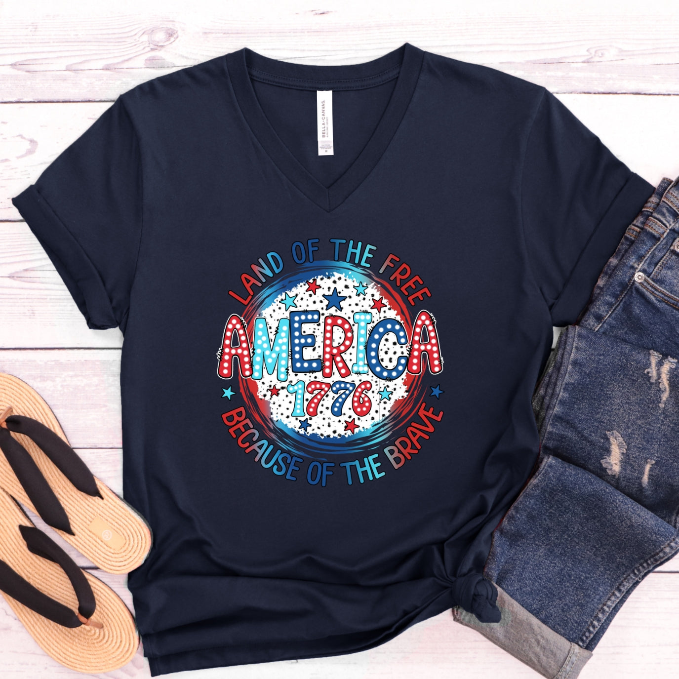 Land Of The Free Because Of The Brave Women's V-Neck Shirt